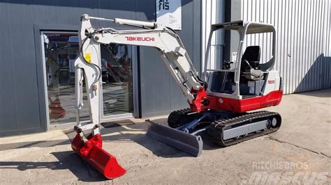 2010 takeuchi mini excavator 11l 6.5w 7 h 7500 lbs|used takeuchi mini bucket.